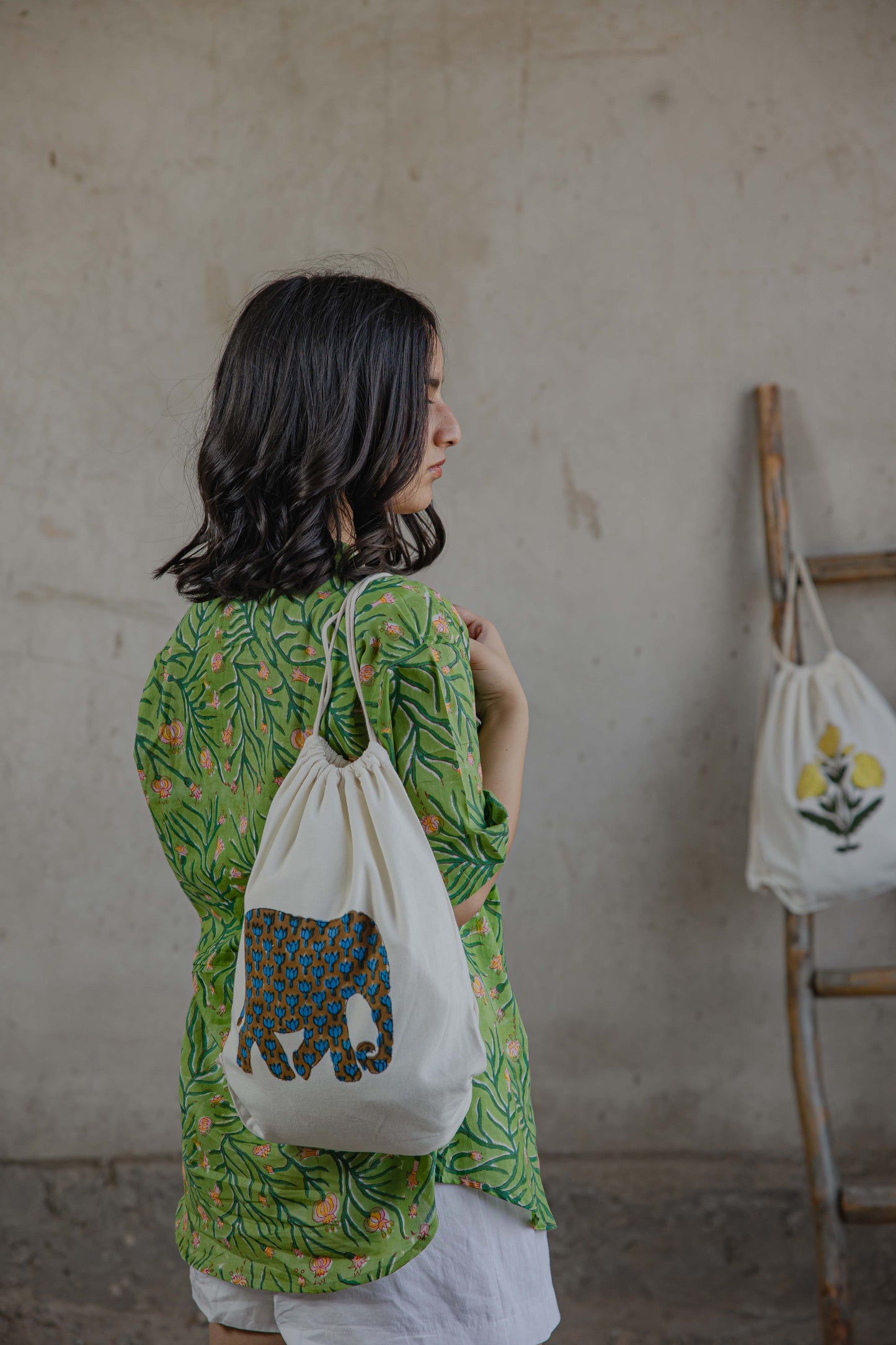 Poppy summer floral shirt styled with our handblock printed canvas backpack