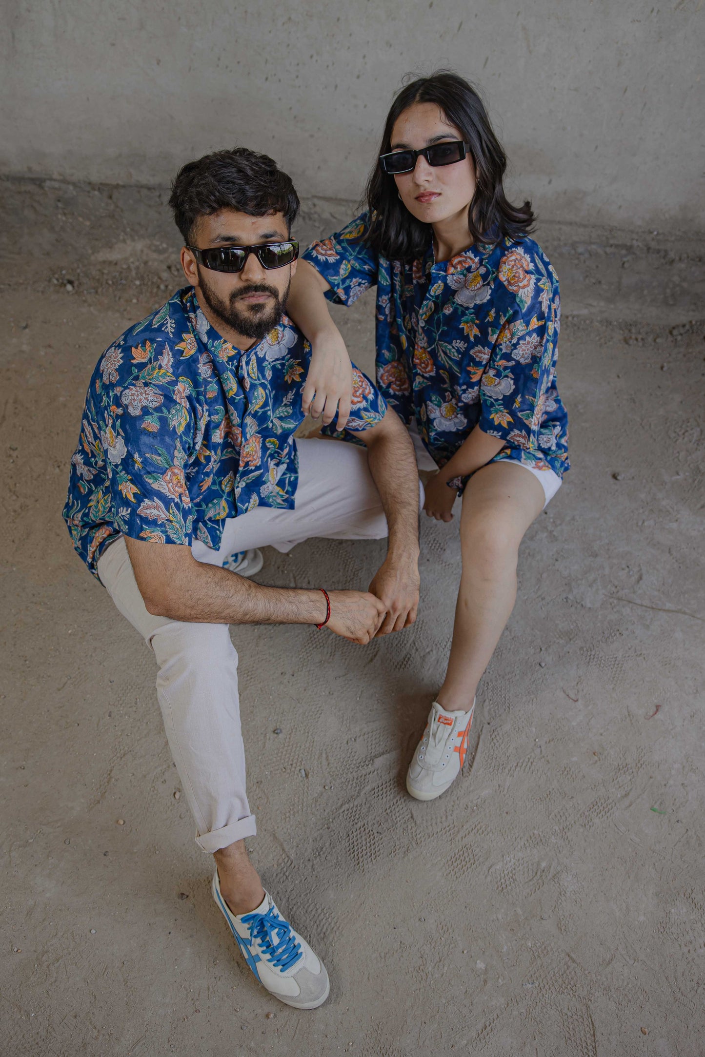 Swag and style overflowing in this couple twinning in Wildflower floral summer shirt