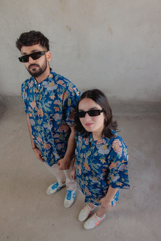 Summer ready couple flaunting Wildflower floral handcrafted summer shirt